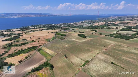 ÇANAKKALE LAPSEKİ SULUCA BOĞAZ VE KÖPRÜ MANZARALI SATILIK TARLA